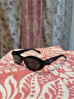 Prada Black Cat-Eye Sunglasses with Dark Lenses